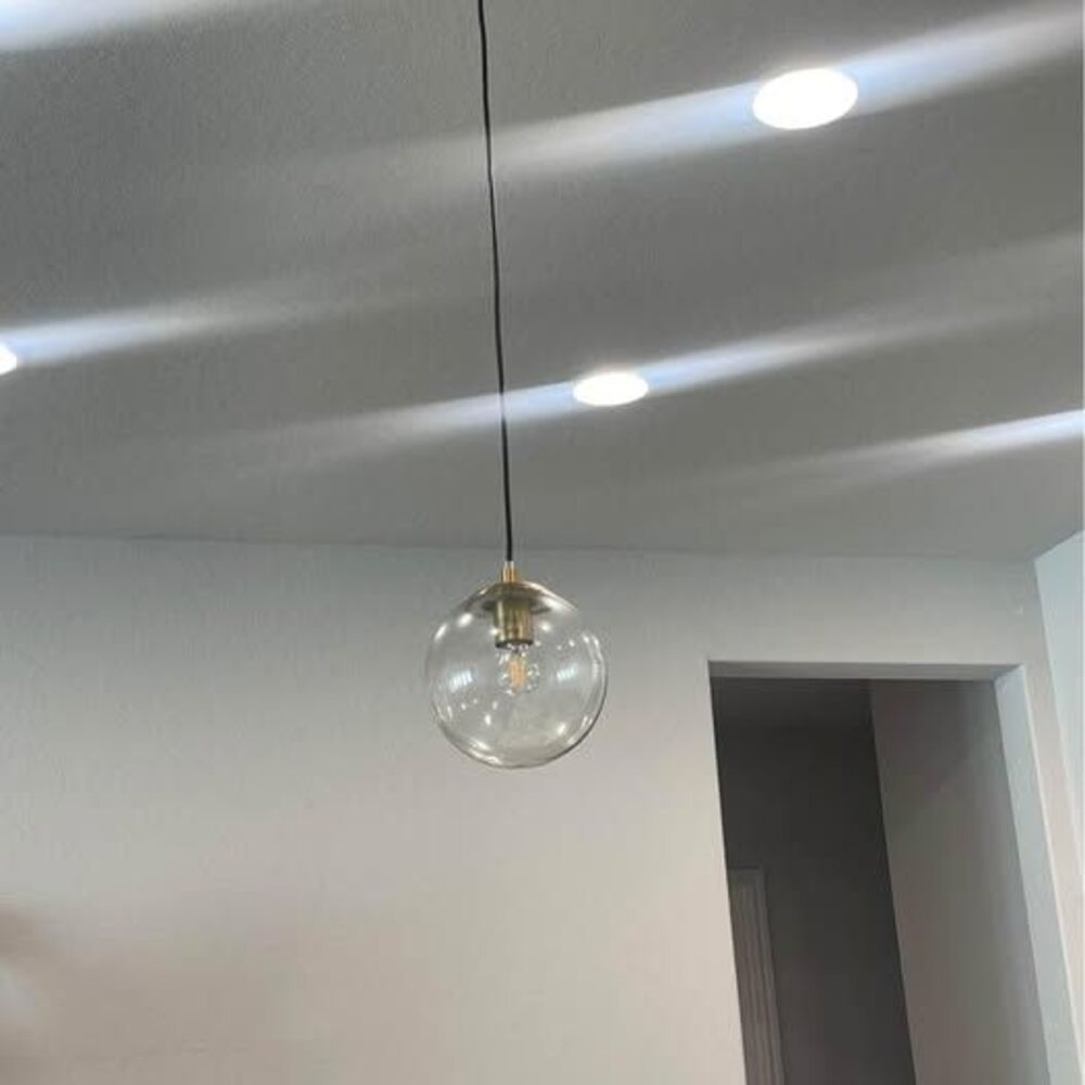 Two Black And Gold Pendant Lights